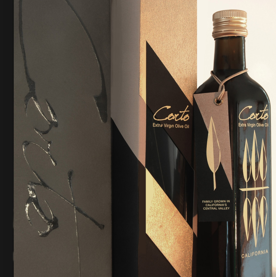 From Left: Bag for olive oil with spot varnish on embossing, box for olive oil, and bottle of olive oil with hang tag and color transfer